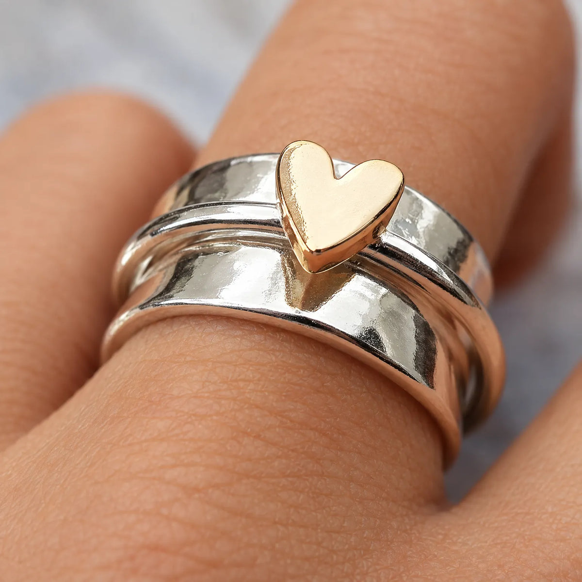 Kinetra - Mixed-Metal Spinner Ring Engaging Restless Hands