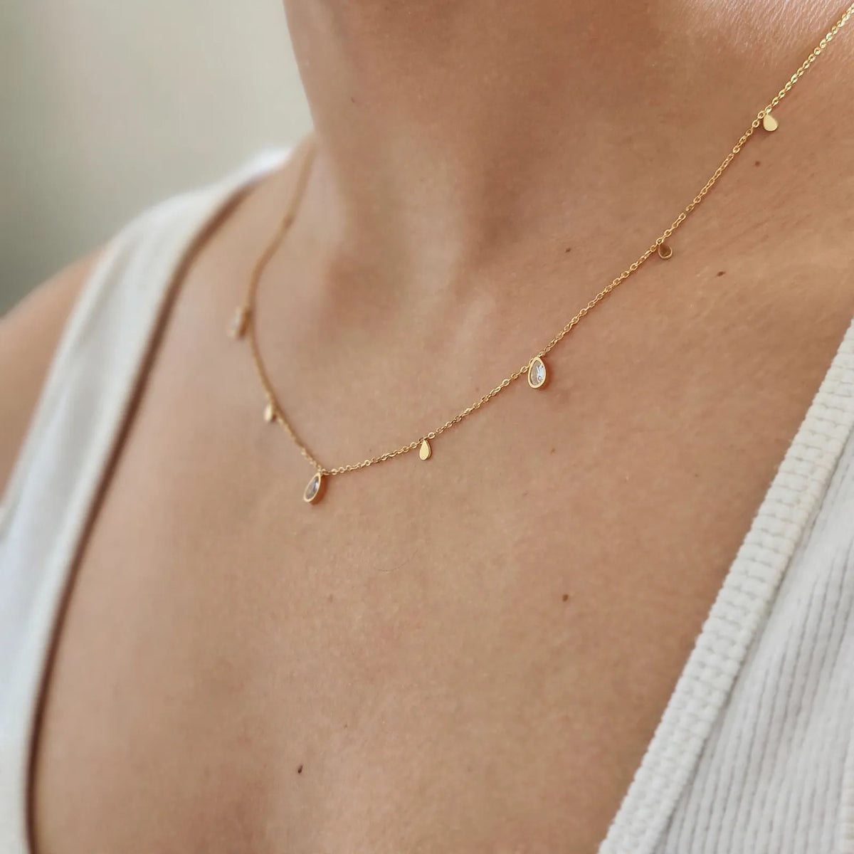 Lumirae - Delicate Drop Charm Necklace Wearing It On Its Own For Everyday Looks