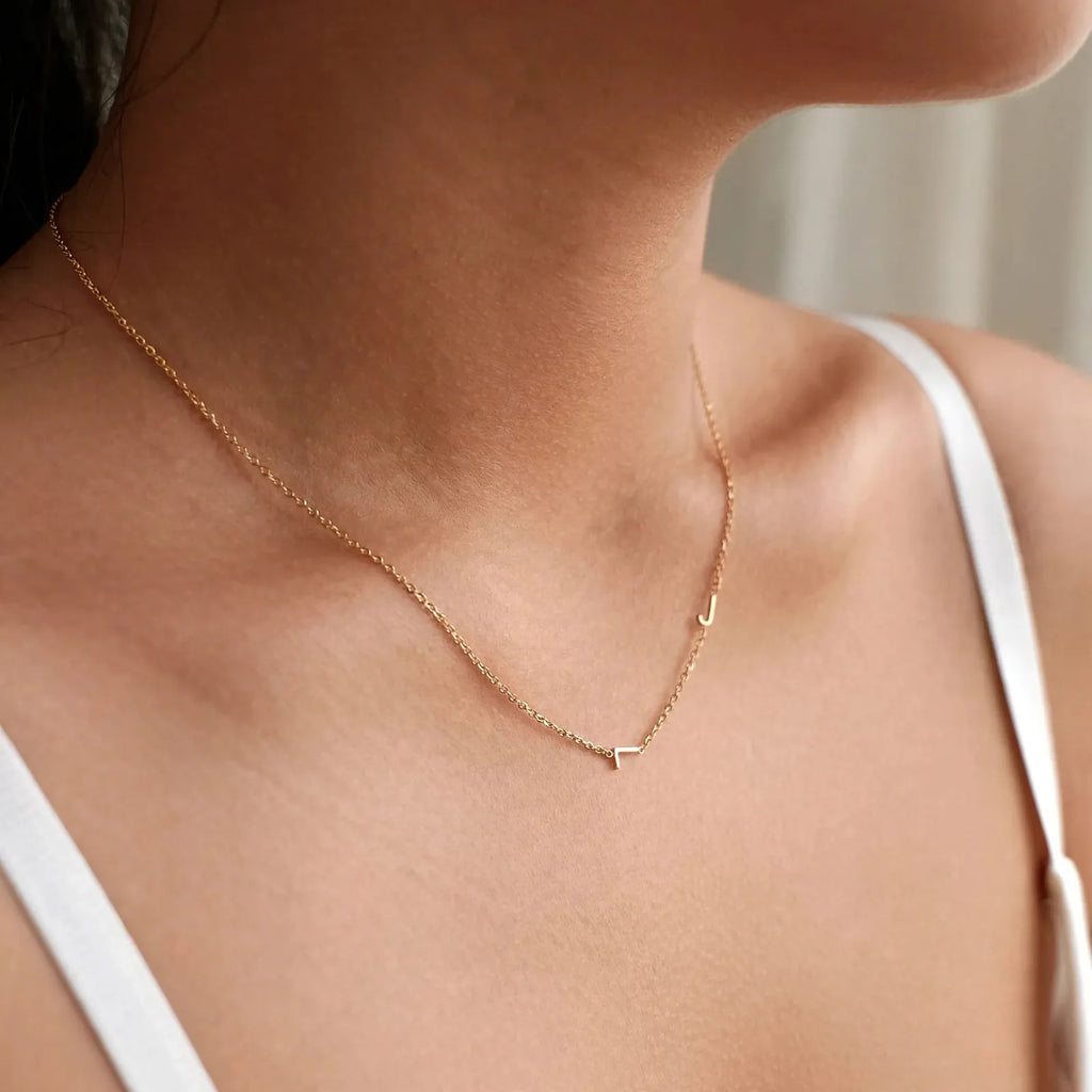 Tesira - Dainty Chain Necklace With Side Initial Wearing Every Day With Simple Tops And Sweaters
