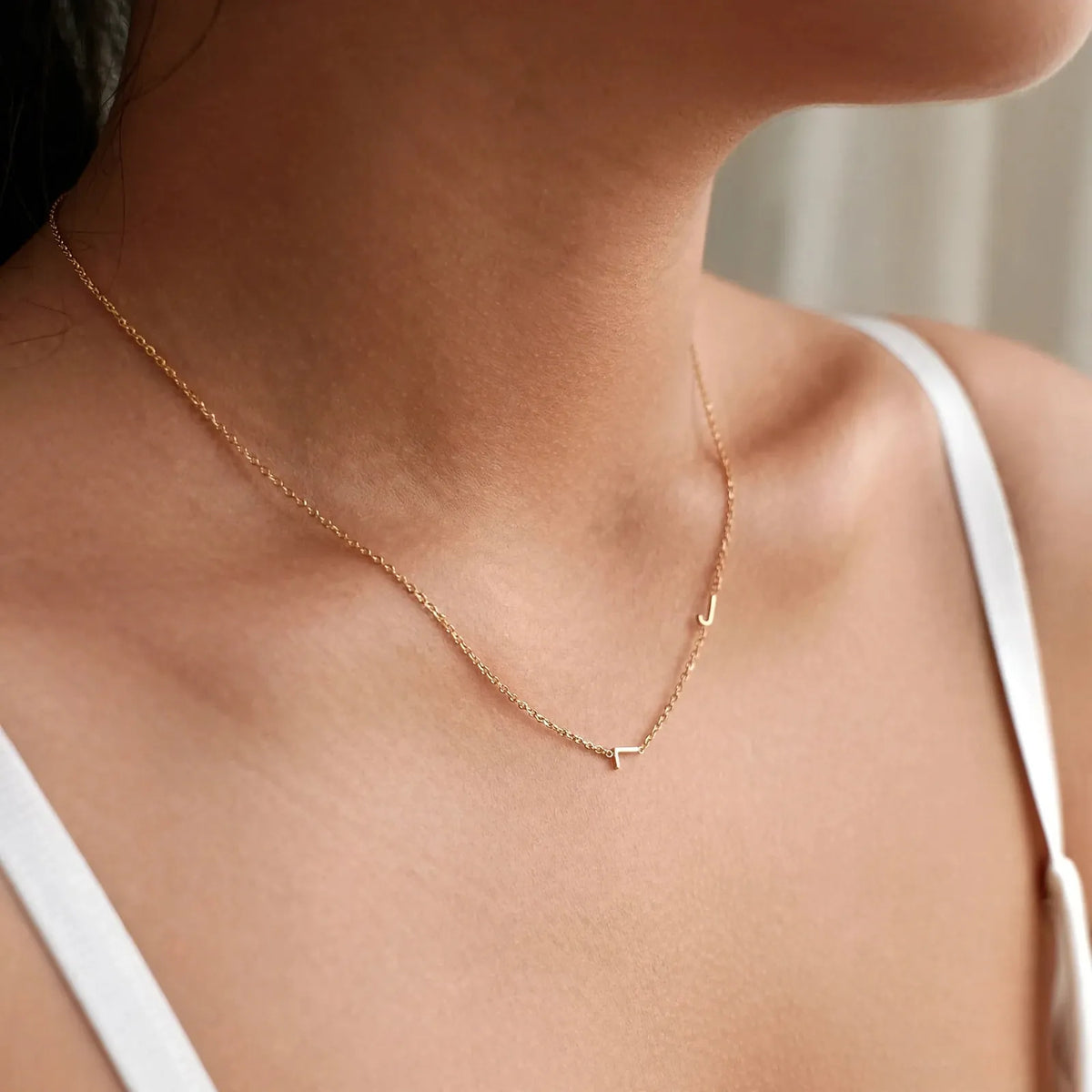 Tesira - Dainty Chain Necklace With Side Initial Wearing Every Day With Simple Tops And Sweaters