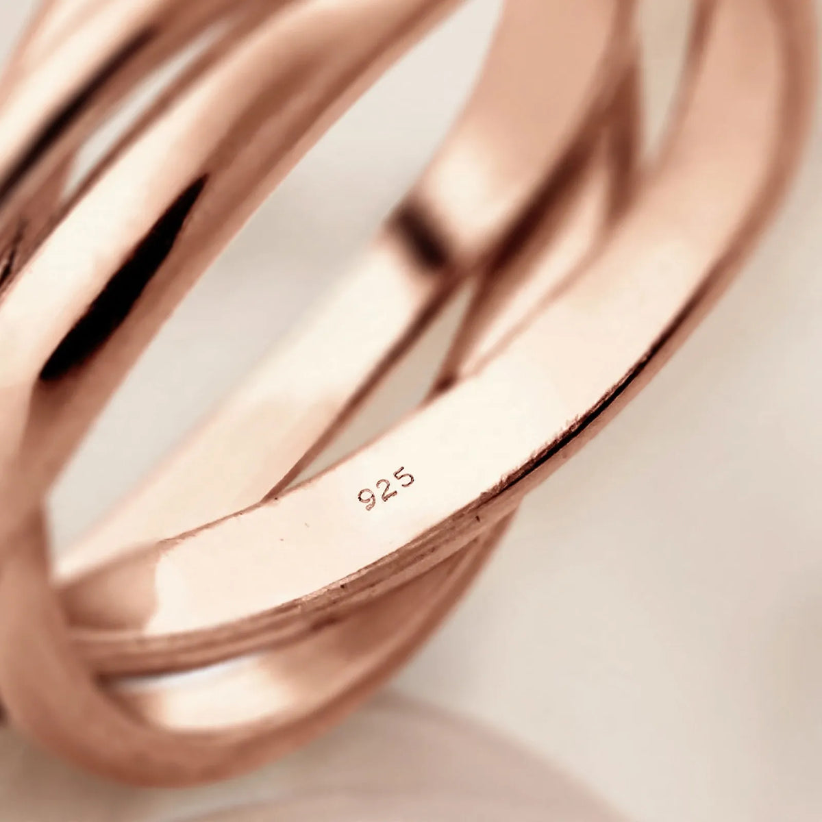 Tessaly - Interlocking Triple Band Ring Wearing On Its Own For An Everyday Look