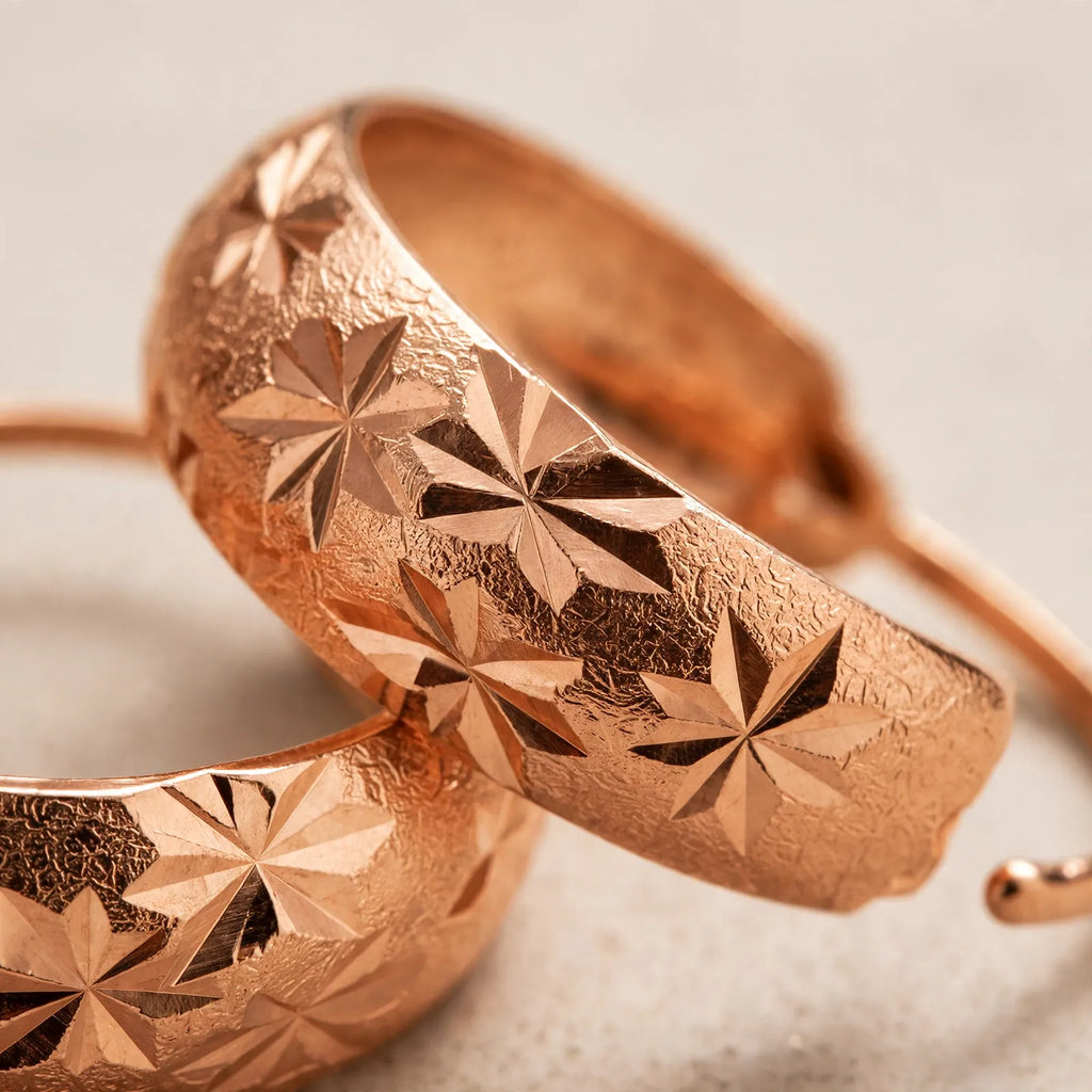 Vaelen - Textured Star Pattern Hoop Earrings Adding Warm Metallic Detail To Everyday Outfits