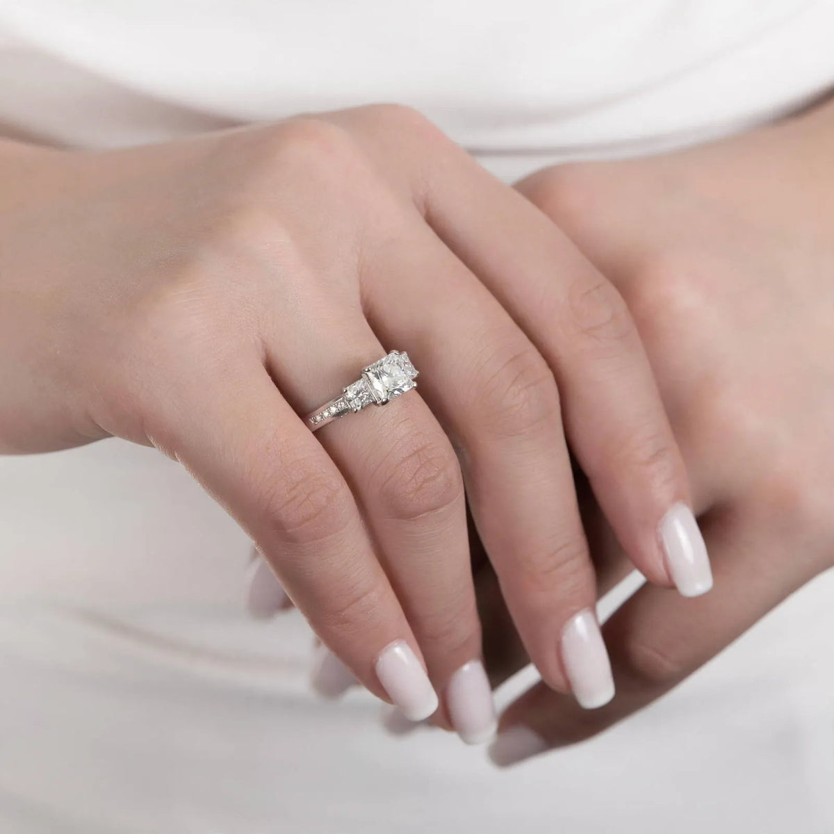 Velmora - Three-Stone Promise Ring With Channel Band Wearing As A Promise Ring